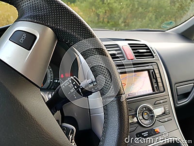 Cruise control switch of Japanese car with big navigation display Stock Photo