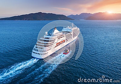 Aerial view of beautiful large white ship at sunset Stock Photo