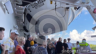 A cruise ship muster drill where all passengers and crew are to report to their assembly station is in case of emergency Editorial Stock Photo