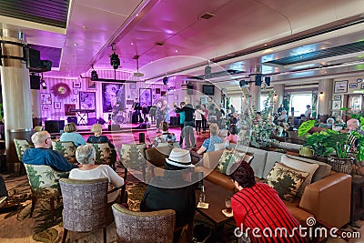 Cruise ship passengers dancing to live music Editorial Stock Photo