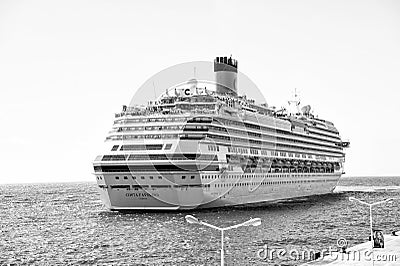 Cruise ship on philipsburg, sint maarten coast. Ocean liner in blue sea on sunny sky. Water transport and vessel. Luxury Editorial Stock Photo