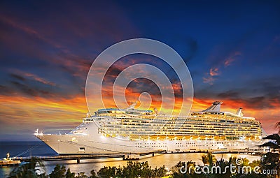 Cruise ship in port on sunset. Stock Photo