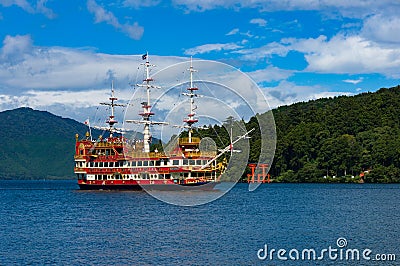 Cruise ship and Torii gate on Ashi lake Editorial Stock Photo