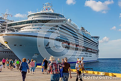 Passengers walking to and from Cruise Ships In Port Editorial Stock Photo