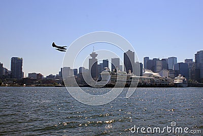 Cruise ships, seaplane, and downtown Vancouver, British Columbia, Canada Editorial Stock Photo