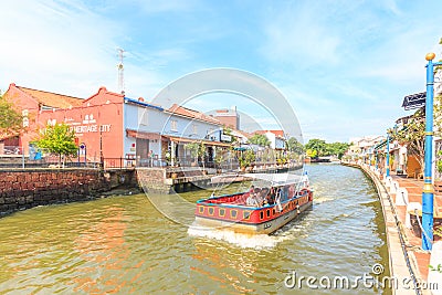 Cruise tour boat sails on the Malacca River in Malacca, Malaysia. Editorial Stock Photo