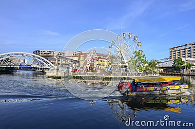 Cruise tour boat sails on the Malacca River in Malacca. Editorial Stock Photo