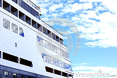 Cruising boat under a blue sky Stock Photo