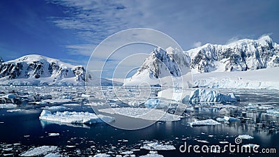 Cruising through the Neumayer channel full of Icebergs in Antarctica. Stock Photo