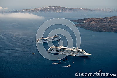 Cruising ship on Santorini island in summer time on Aegean sea Editorial Stock Photo