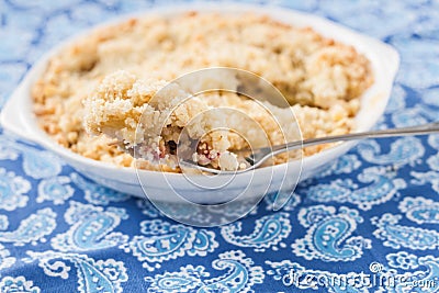 Crumble with rhubarb and apple Stock Photo