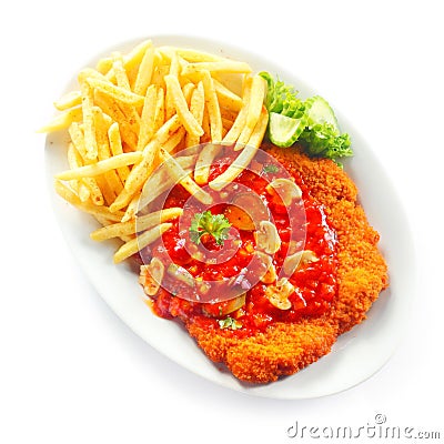 Crumbled Escalope with Fries on White Plate Stock Photo