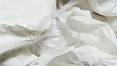 Crumbled up white used plastic and paper/cloth wrap top view graphic texture template Stock Photo