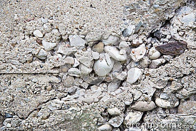 Crumbling Concrete foundation wall Stock Photo