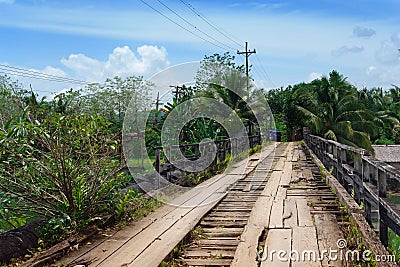 Crumbling tropical bridge Stock Photo