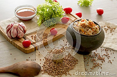 Crumbly buckwheat with butter, food healthy Stock Photo