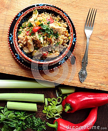 Crumbly pearl barley with vegetables Stock Photo