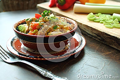 Crumbly pearl barley with vegetables Stock Photo