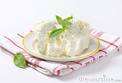 Crumbly white cheese Stock Photo