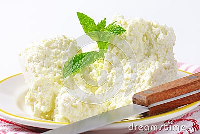 Crumbly white cheese Stock Photo