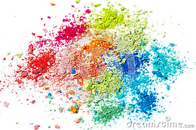 Crumbs of multi-colored chalk on a white background. Joy, Carnival. A game for children. Art Stock Photo