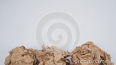 Crumpled brown paper.It is mauled on white background Stock Photo