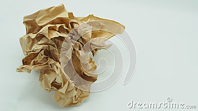 Crumpled brown paper.It is mauled on white blackground Stock Photo