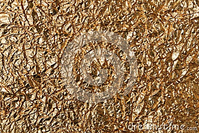 Crumpled Gold Foil. Background image and texture Stock Photo