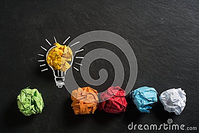 Crumpled paper symbolizing different solutions with one standing out Stock Photo