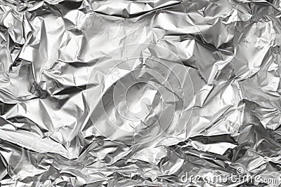 crumpled and straightened aluminum foil Stock Photo