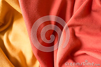 Crumpled yellow and orange jersey fabric Stock Photo