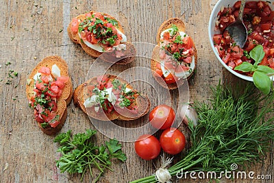 Crunchy bruschettas with fresh vegetables Stock Photo