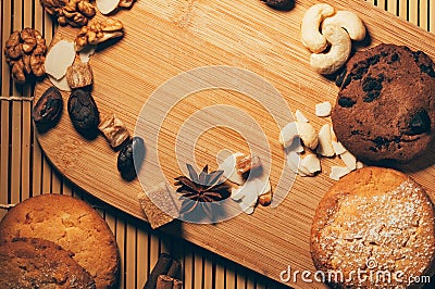 Crunchy chocolate cookies with nuts, cocoa chips and spices on c Stock Photo