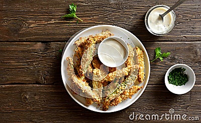 Crunchy zucchini breaded sticks with dip sauce Stock Photo