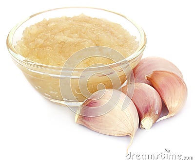 Crushed garlic with whole ones Stock Photo