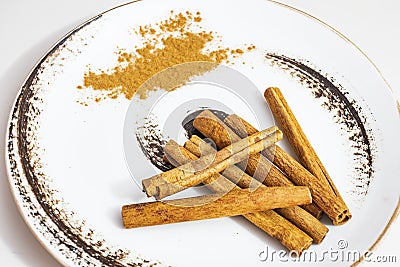 Istanbul,turkey-june 16,2020.crusted and powdered cinnamon on a decorative plate. Editorial Stock Photo