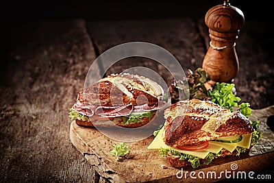 Crusty brown lye bread roll sandwiches Stock Photo