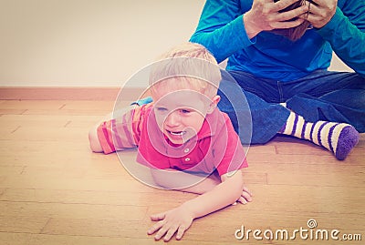 Crying child, tired father Stock Photo