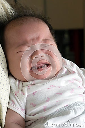 Crying infant Stock Photo