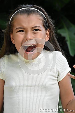 A Crying Petite Philippina Person Closeup Stock Photo