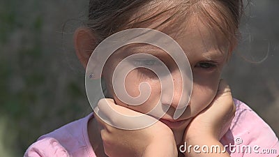 Crying Unhappy Child with Sad Memories, Stray Homeless Kid, Abandoned, Miserable Stock Photo