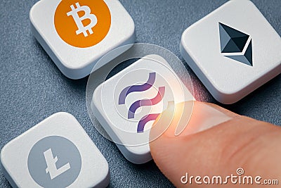 Finger pressing cursor key with libra coin symbol Editorial Stock Photo