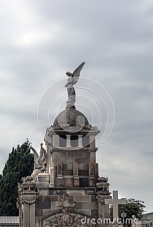 Crypt with angel sculpture on the roof Editorial Stock Photo