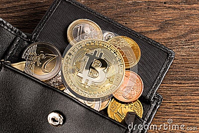 Crypto currency bitcoin euro wallet concept wooden background Editorial Stock Photo