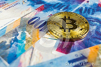 Crypto currency concept - A Bitcoin with Swiss franc currency, Switzerland Stock Photo