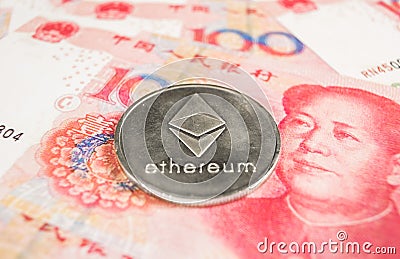 Crypto currency concept - Ethereum coin with Chinece currency RMB, Renminbi, yuan Editorial Stock Photo