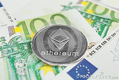 Crypto currency concept - A Ethereum with euro bills Editorial Stock Photo