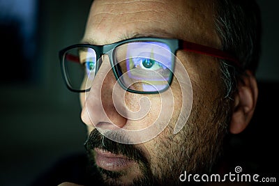 Crypto trader investor analyst looking at computer screen analyzing financial graph data on pc Stock Photo