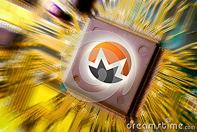 Cryptocurrency and blockchain - financial technology and internet money - circuit board mining and coin Monero XMR Editorial Stock Photo