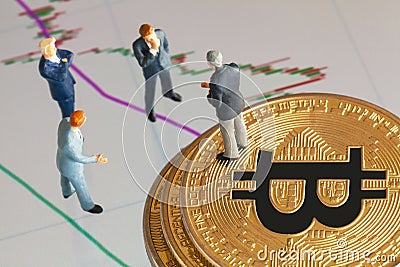 cryptocurrency concept with businessmen and bitcoin Stock Photo